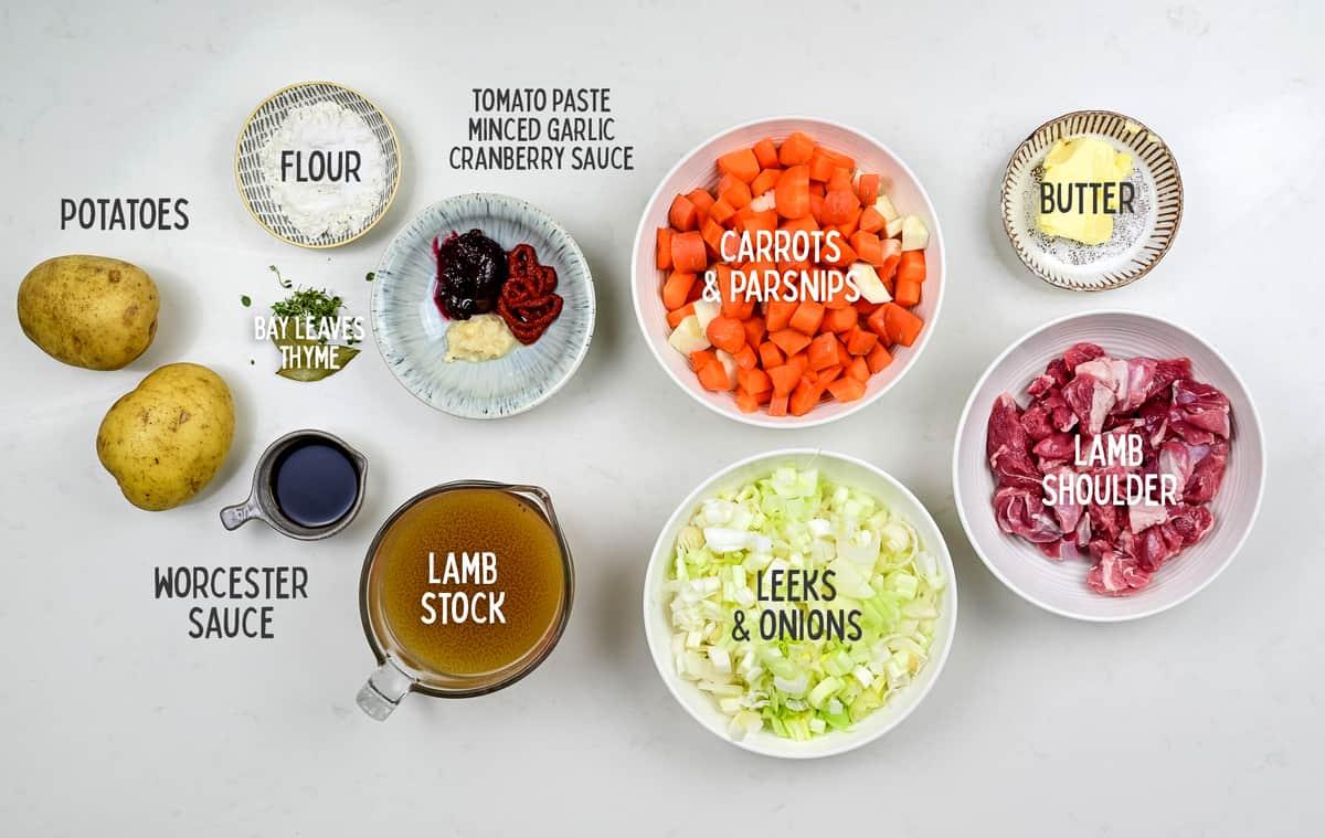 Lancashire Lamb hotpot ingredients in bowls on a white background