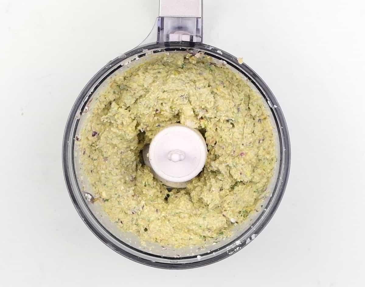 Feta, bread, herbs, onion and garlic processed to a paste
