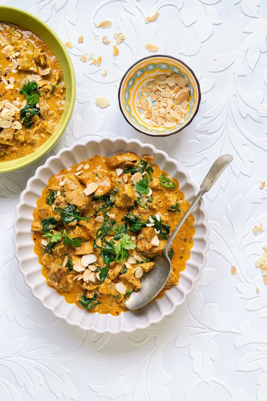 creamy curry with leftover turkey and spinach in a bowl