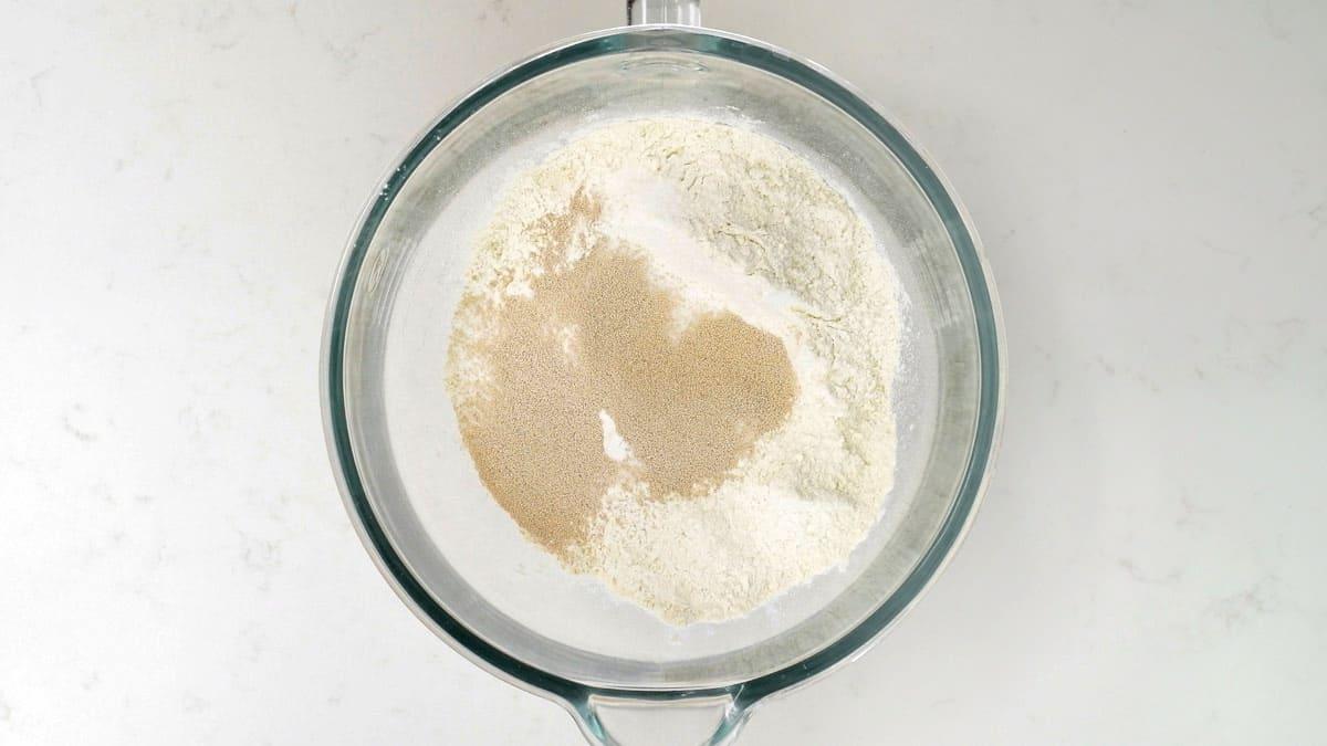 Flour, sugar, salt and yeast in a stand mixer bowl
