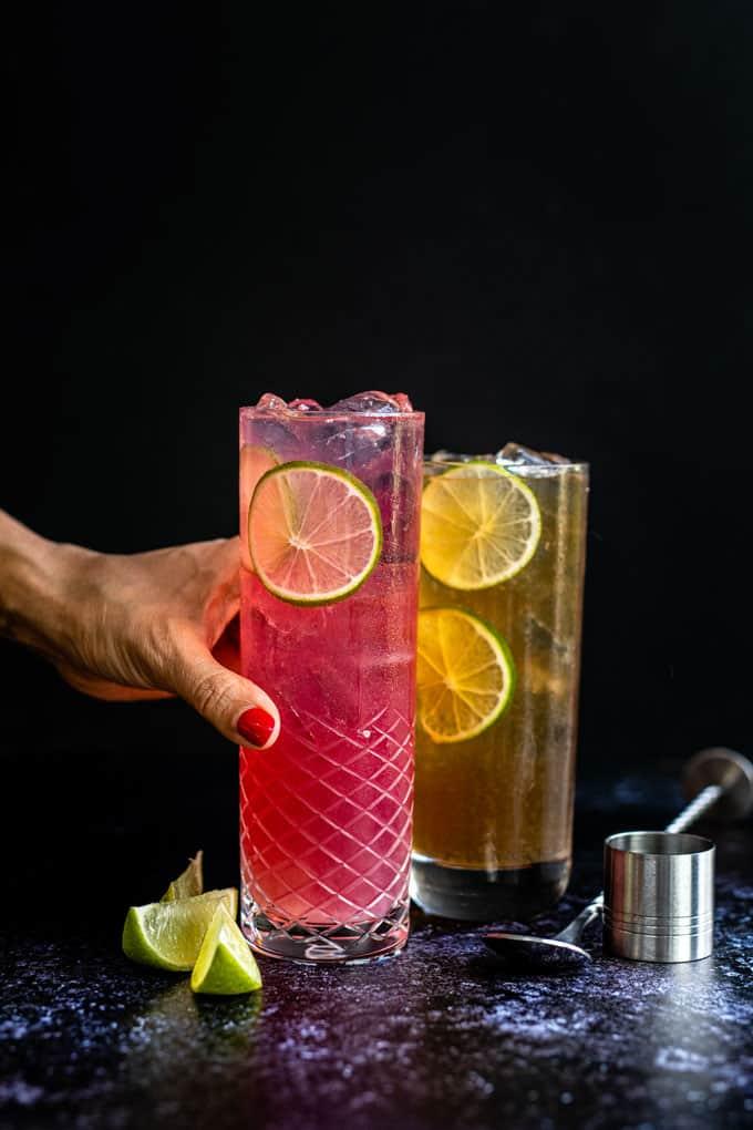 Long Island Iced tea and Long Beach Iced tea in tall glasses against a dark background