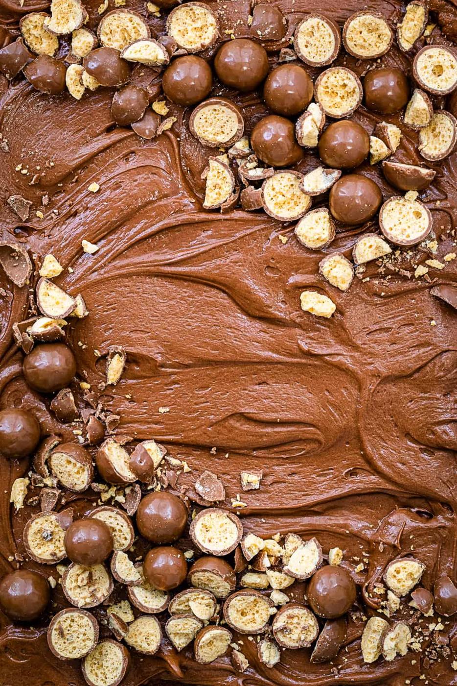 close up on chocolate frosted Malteser cake