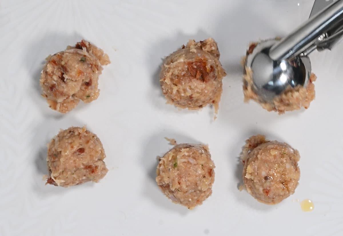 making meatballs with a cookie scoop