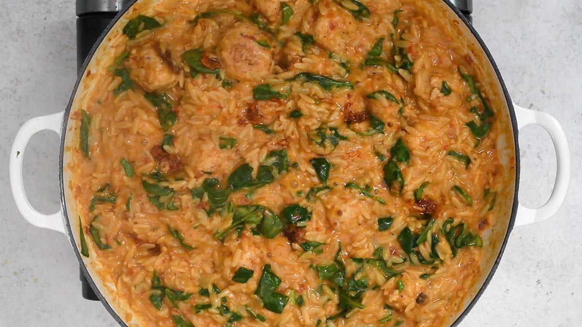 Marry me chicken meatballs with orzo in a pan