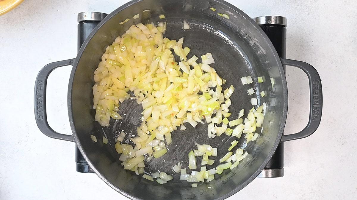 sautéing onions in a Dutch oven