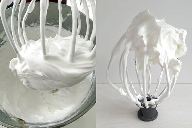 Two images show a metal whisk attachment covered in glossy, stiff peaks of meringue, perfect for topping a meringue cake—one still in the mixing bowl and the other standing upright on a white surface.