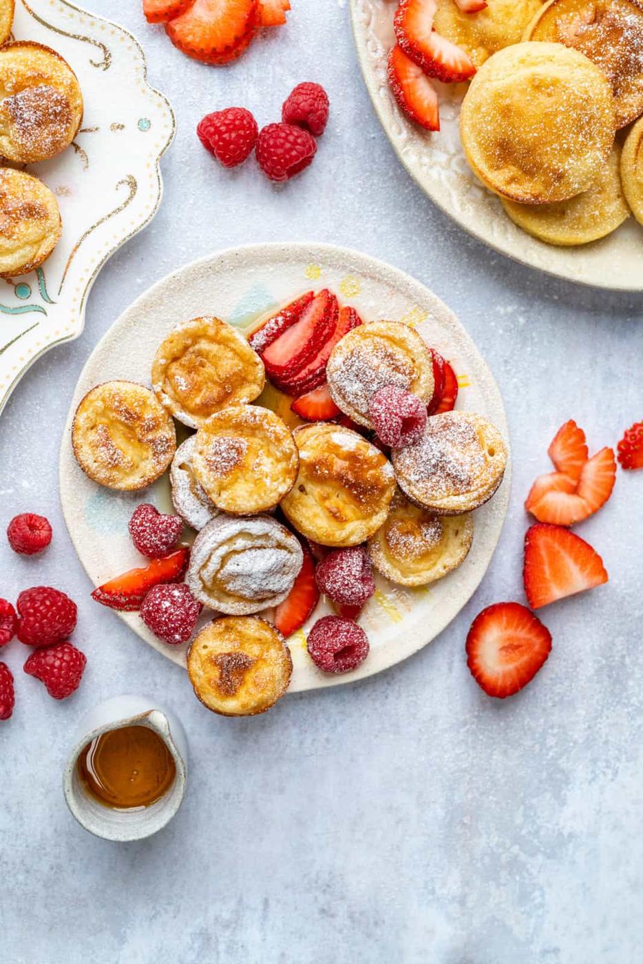 overhead view of plate with mini pancakes and berries