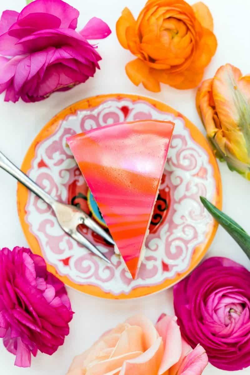slice of mirror glaze no bake cheesecake