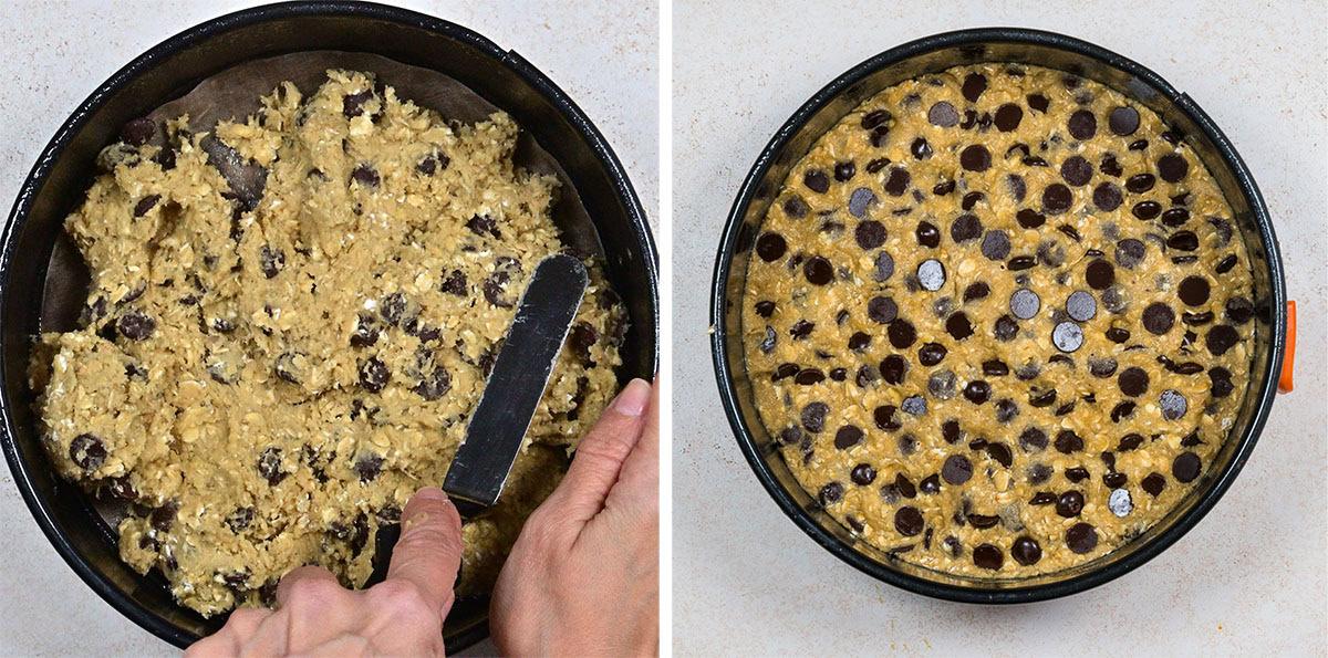 Two side-by-side images show a round baking tin with biscuit dough; on the left, a hand spreads the dough with a spatula, and on the right, the dough is evenly spread and topped with chocolate chips.