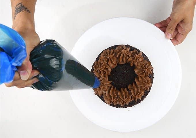 Assembling chocolate layer cake