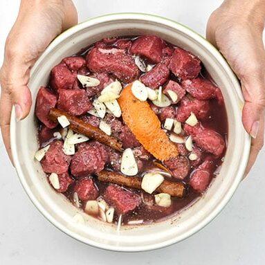 marinating beef to make greek stifado