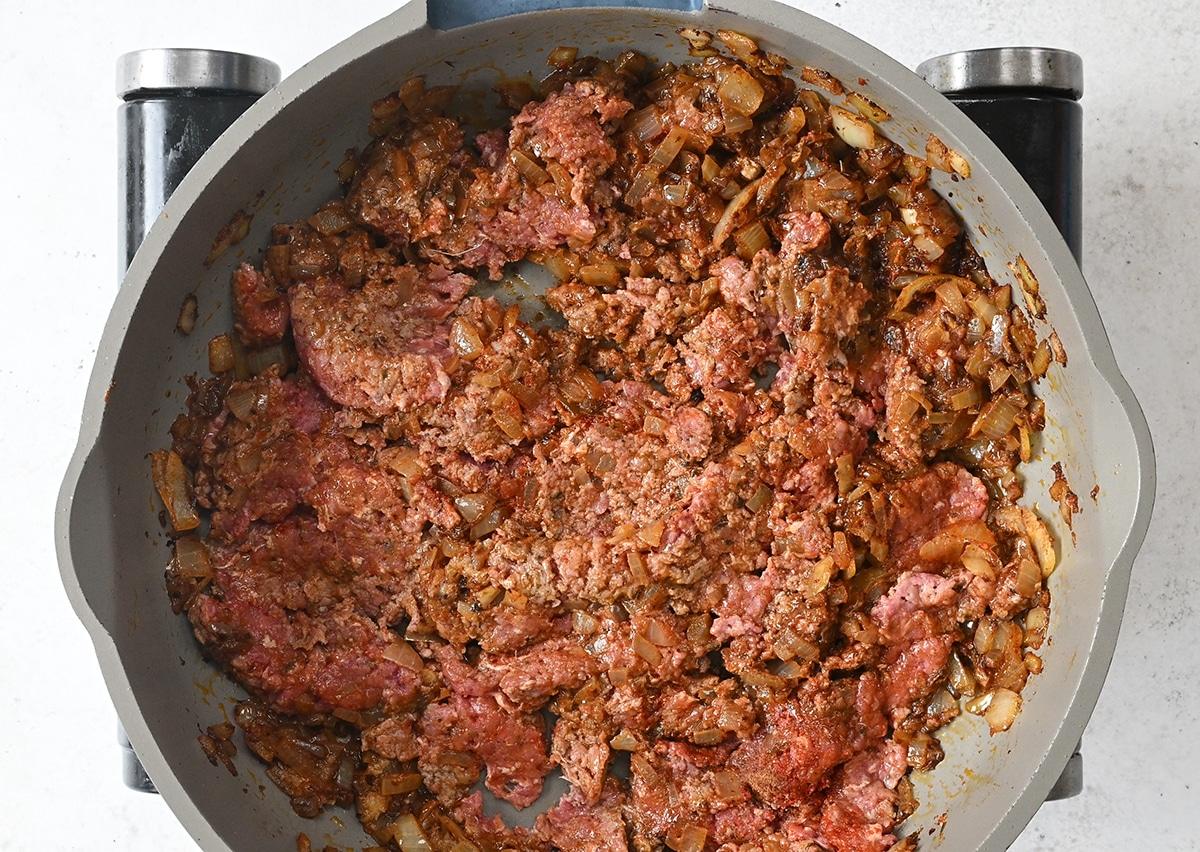 browning ground beef in a skillet