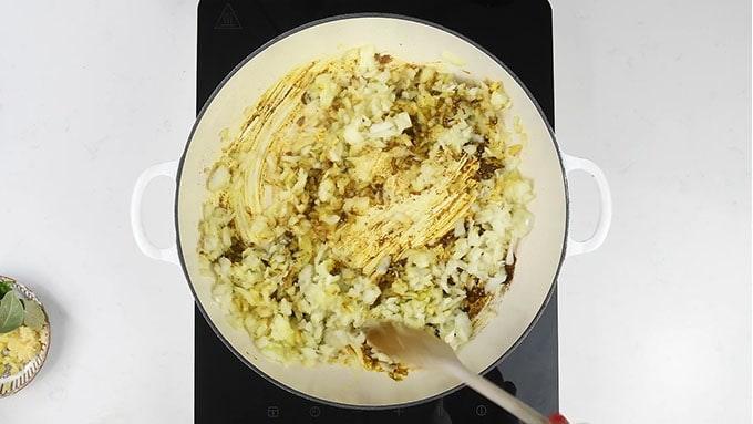Cooking onions in a large pan