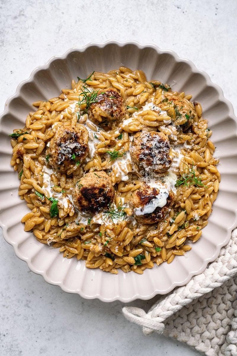 Bowl serving of Swedish meatball orzo pasta