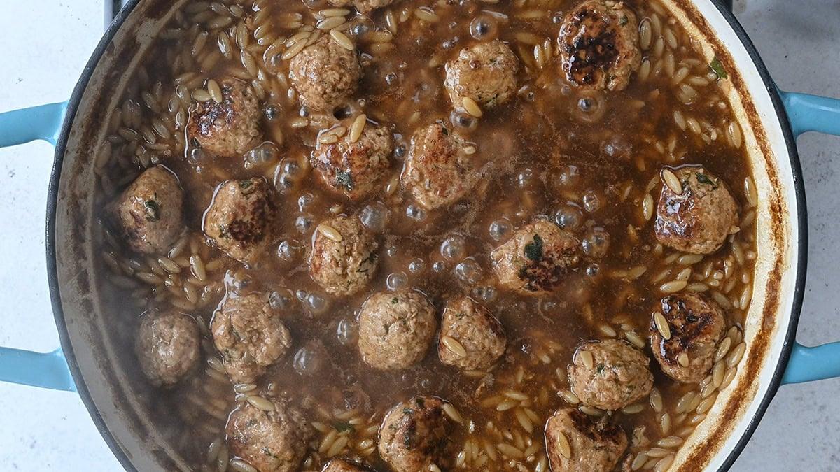 meatballs cooking in gravy