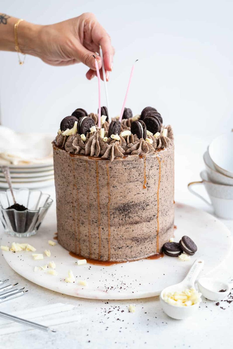 Adding candles on an Oreo Cake