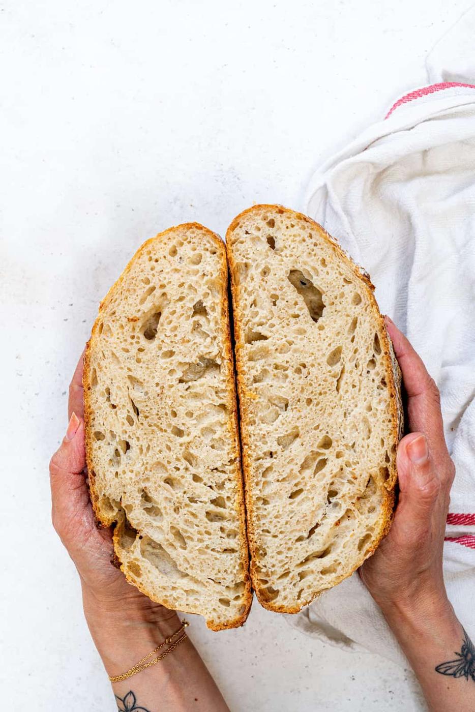 Sourdough loaf sliced in half to show the interior