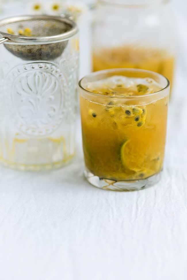 A glass of Passion fruit caipirinha served in a rocks glass