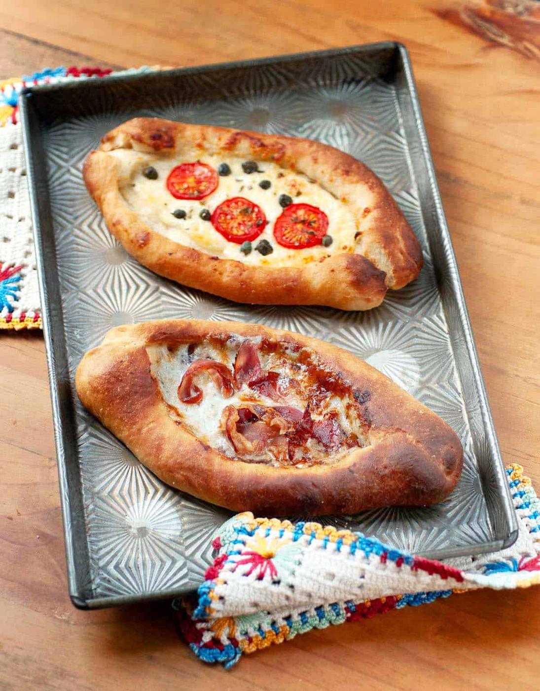 two Peinirli on a baking tray