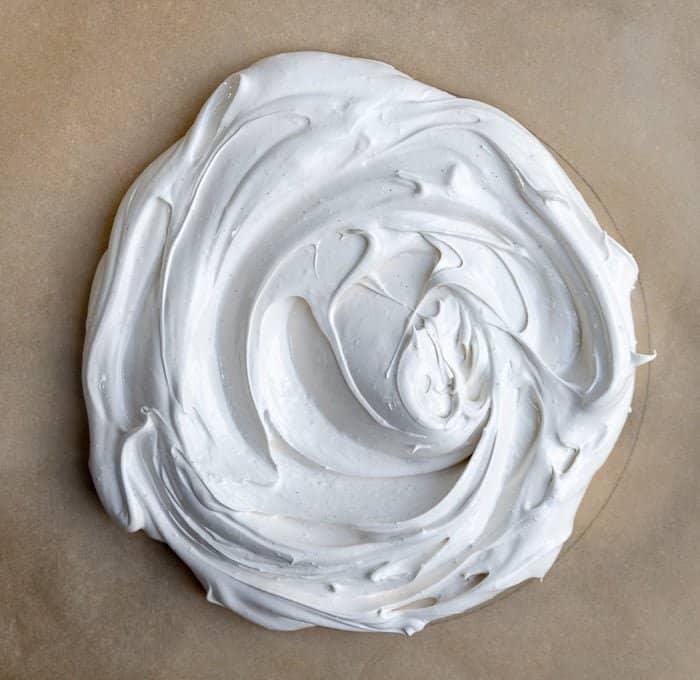 Meringue spooned on a baking sheet