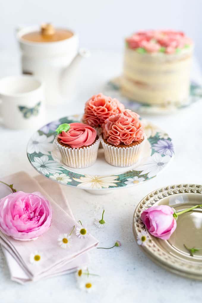 Cupcakes frosted with easiest Swiss buttercream on a cake stand