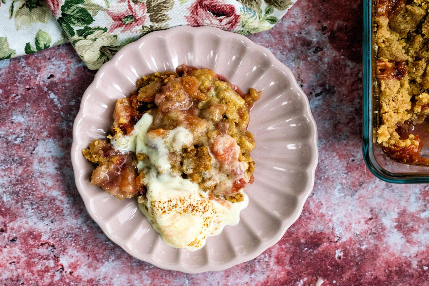 apple plum crumble on a small dish