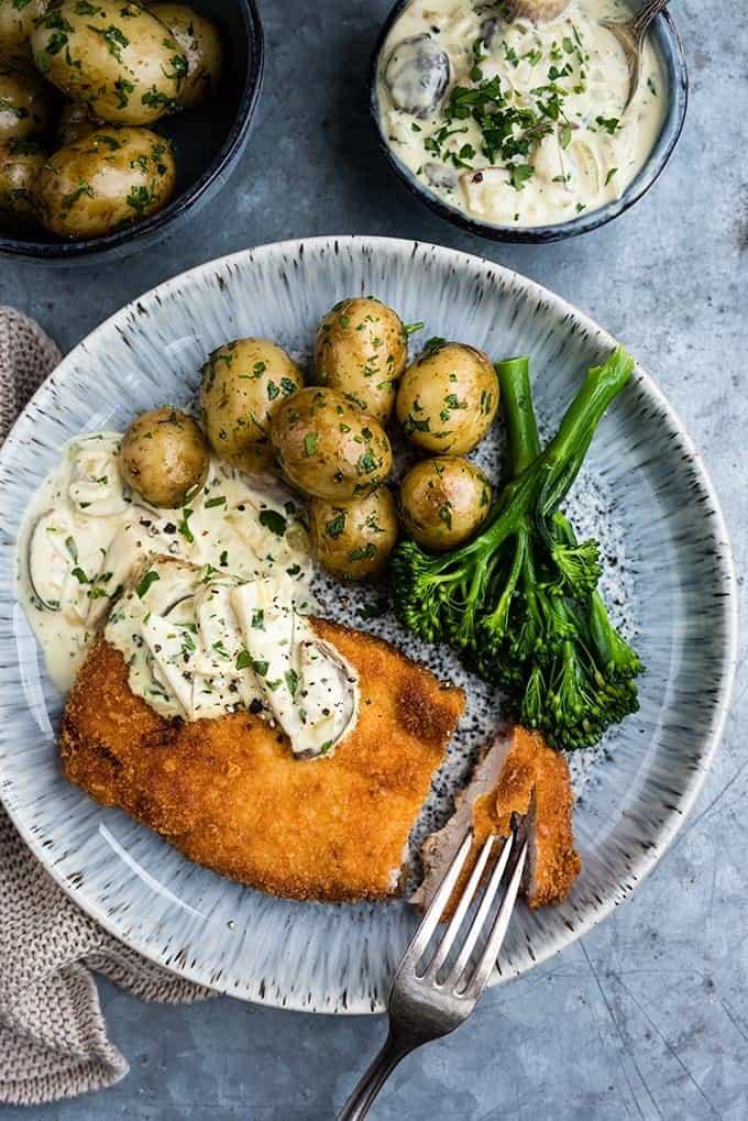 Pork schnitzel with creamy mushroom sauce