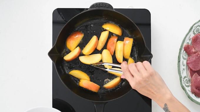 Pan frying apples in a skillet