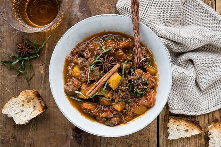 Pressure Cooker Vietnamese beef stew in a bowl with bread