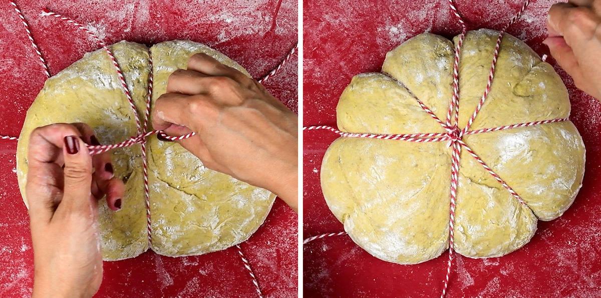Tying the oiled strings loosely over the shaped dough to divide it into eight pumpkin segments.
