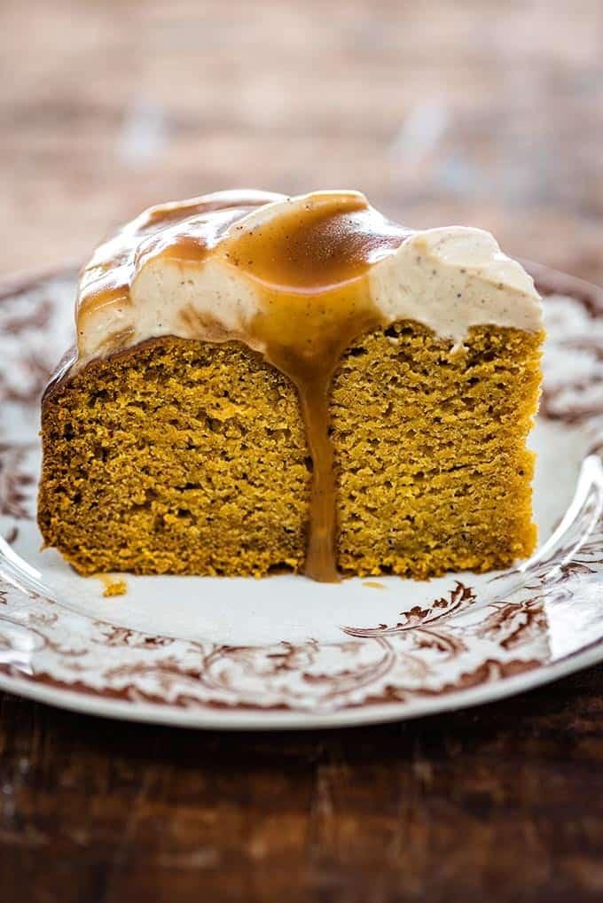 This pumpkin spice cake requires no mixer and only one bowl! Top with cream cheese frosting and toffee drizzle and watch it disappear fast…