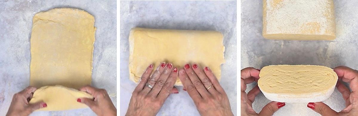 Folded Danish pastry dough cut open to show the flaky butter layers