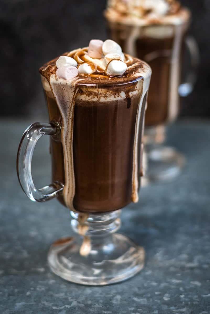 Red wine hot chocolate with marshmallows and whipped cream topping
