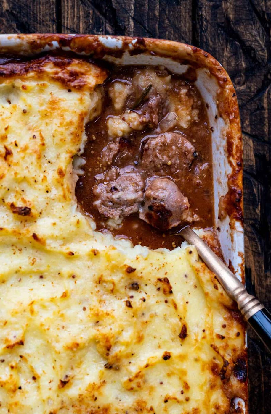 Close up on sausage and mash pie