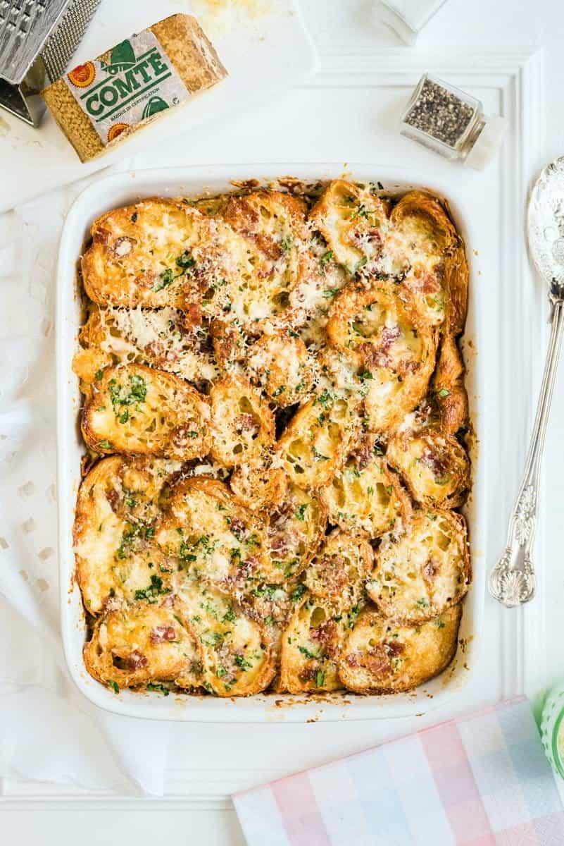 This savoury croissant pudding with Comté cheese and bacon is perfect for feeding a crowd on special occasions!