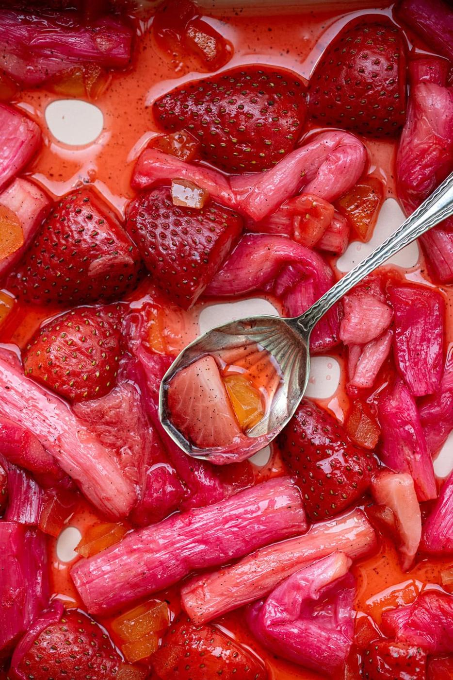 roasted strawberries and rhubarb in a pan, close up