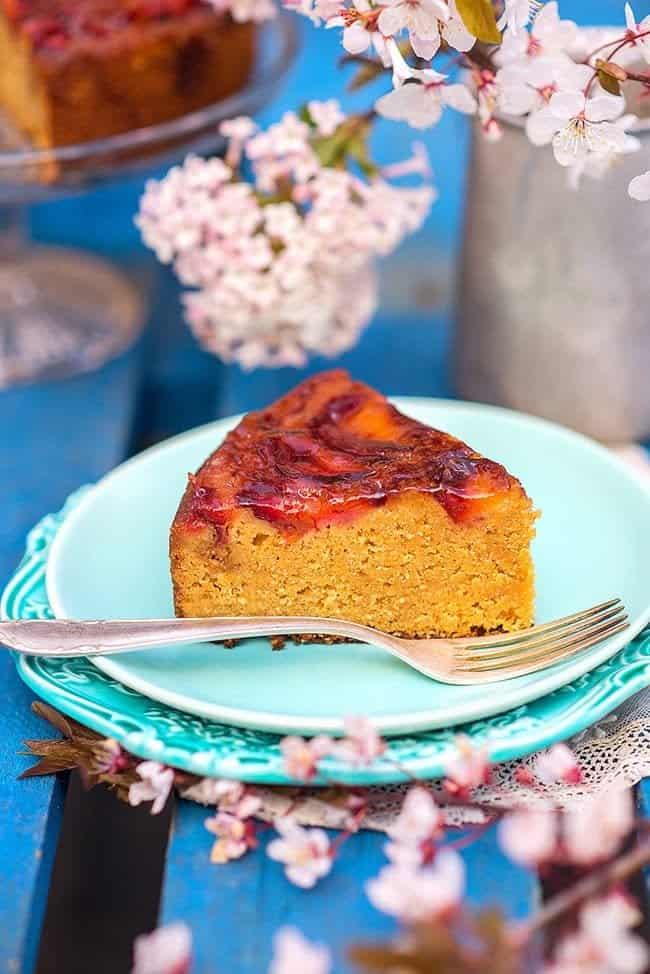 slice of plum cake on an aqua plate