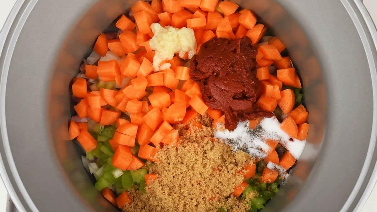 Ragu ingredients in a slow cooker