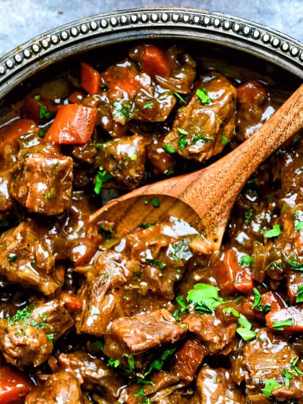 close up on a bowl with slow cooker beef and ale stew