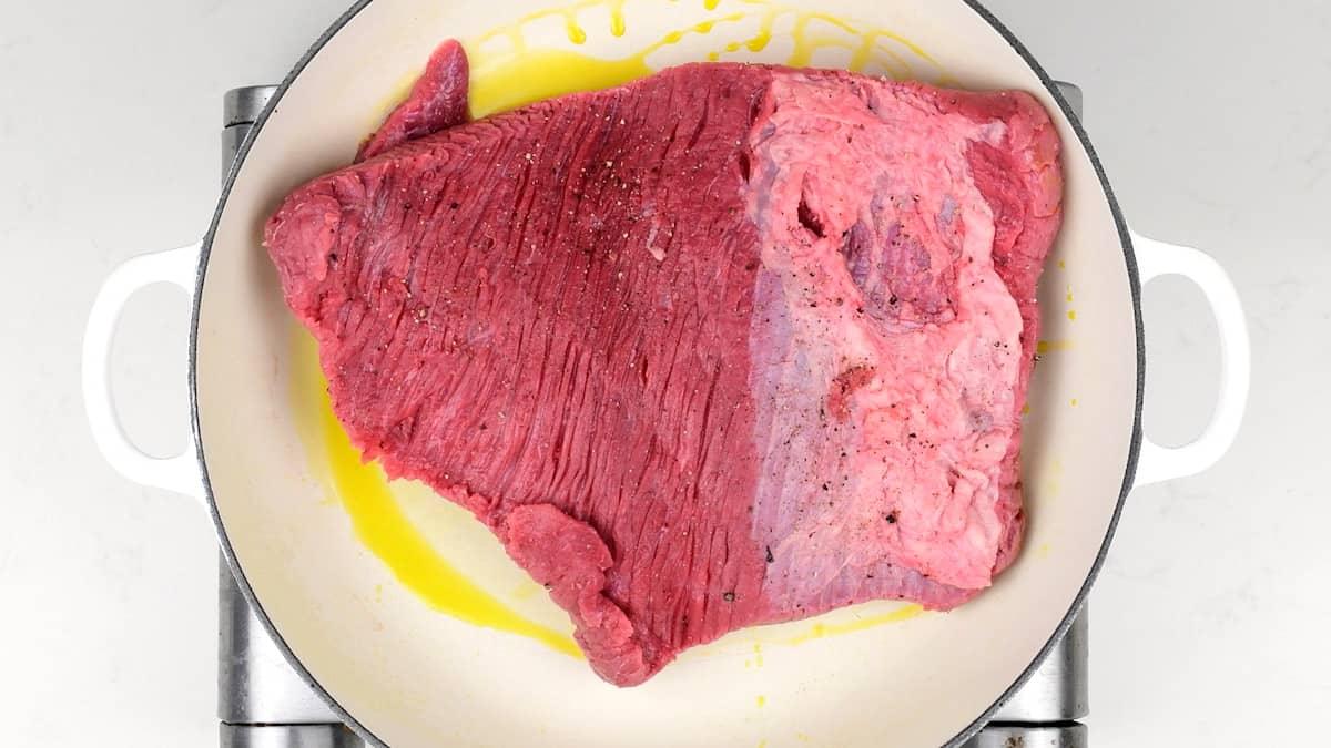 Searing beef brisket in a casserole