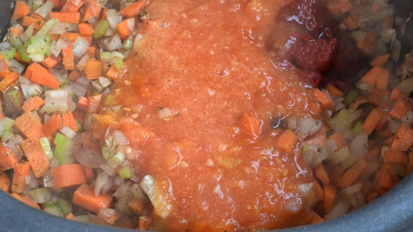 preparing lamb casserole in a slow cooker close up