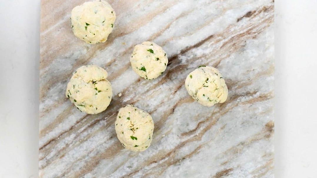 Rolling dumplings for chicken stew