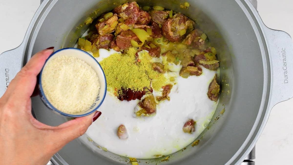 making lamb curry in a slow cooker