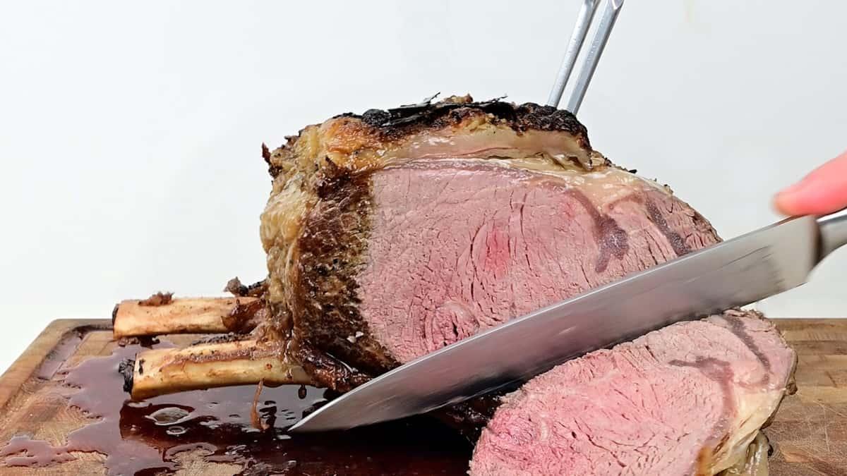 Carving standing rib joint of beef