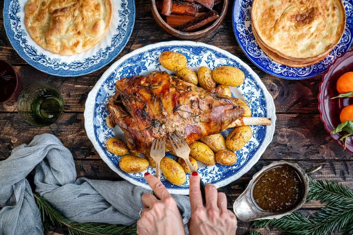 Roast leg of lamb of a platter