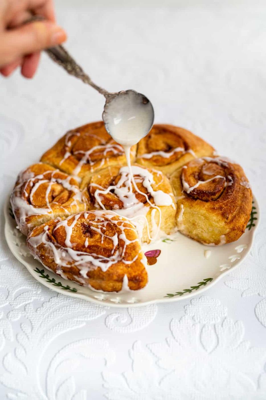 Drizzling cinnamon rolls with glaze