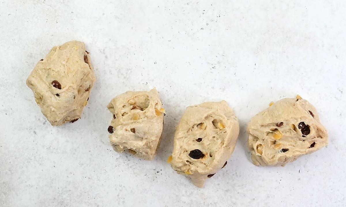 hot cross bun dough divided into four