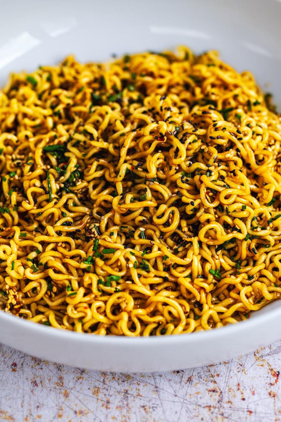 Spicy garlic noodles in a large bowl