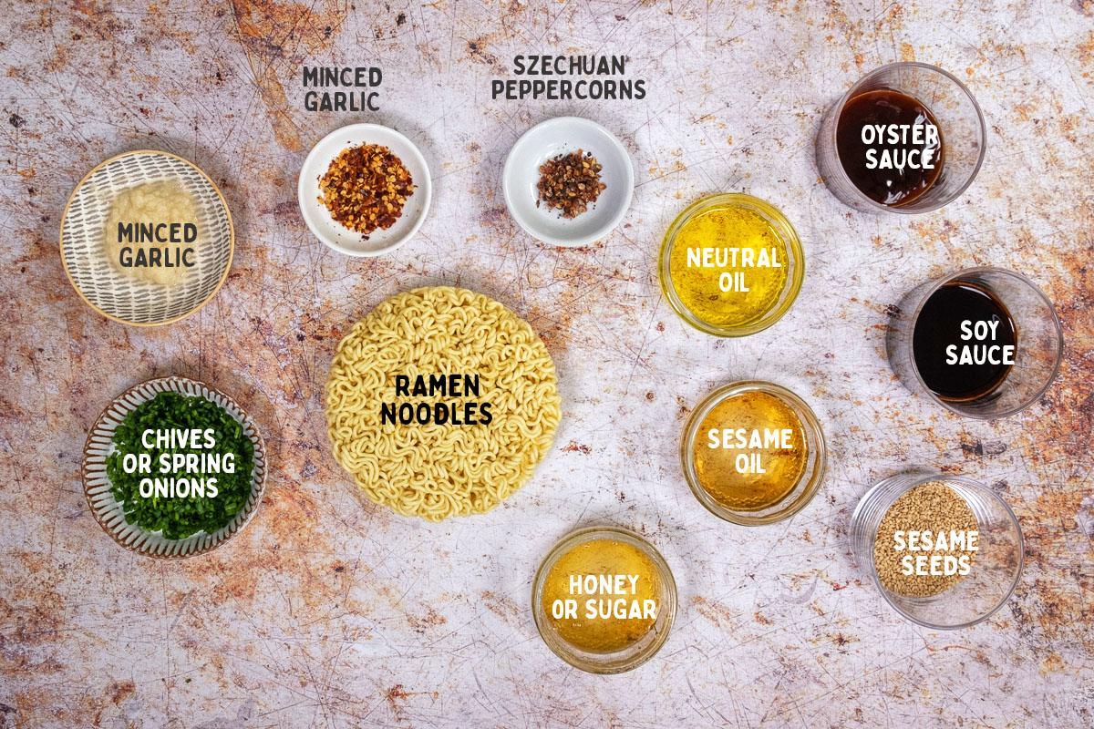 Ingredients for spicy garlic noodles with captions