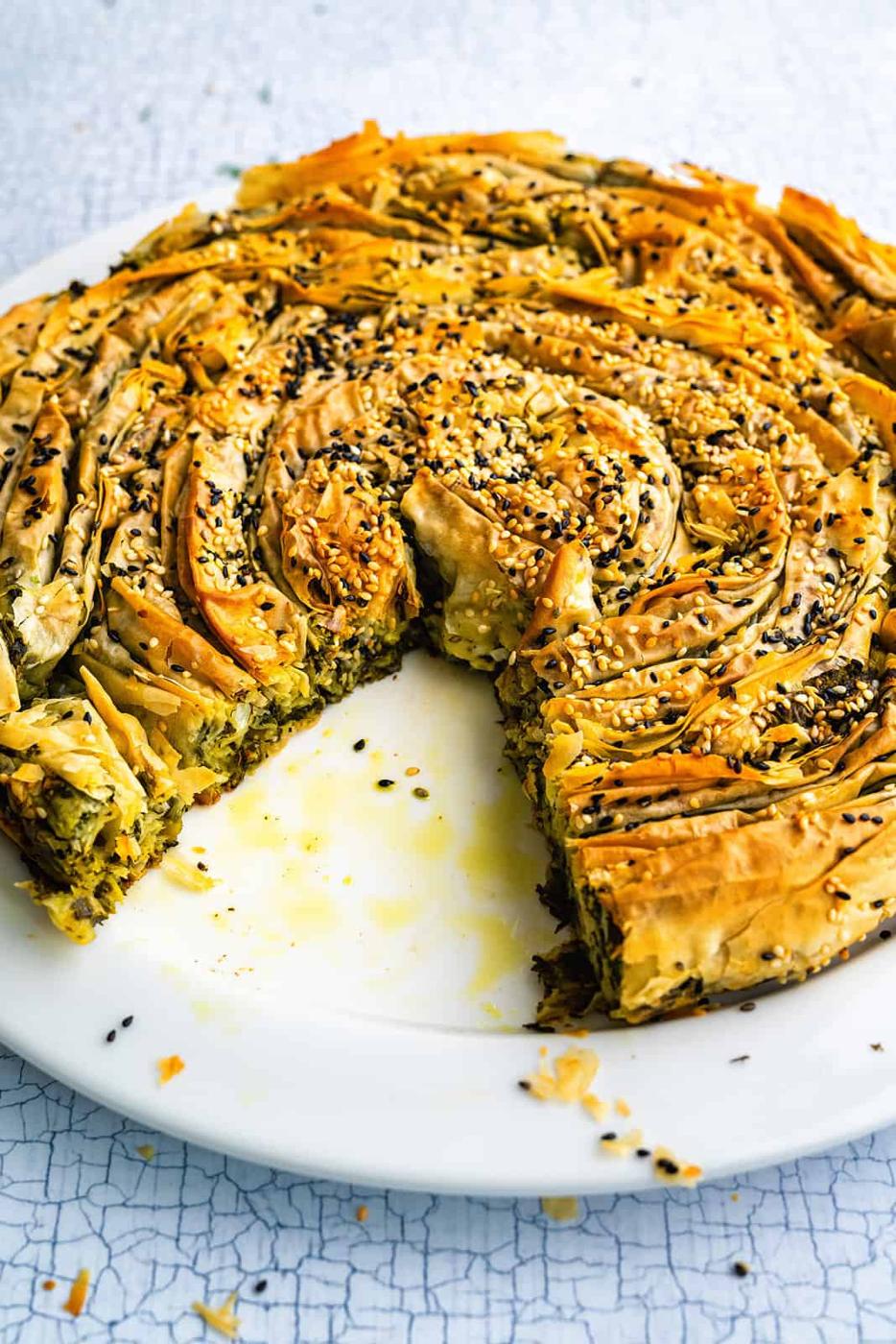 sliced spanakopita on a plate
